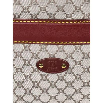 CELINE. Baguette in monogram canvas and gold...