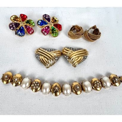 Lot of costume jewelry in gold metal including:...
