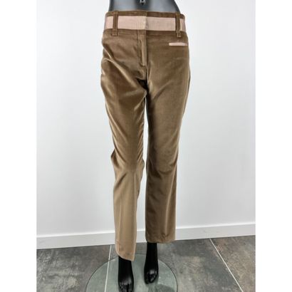 CELINE. Straight pants in beige velvet. Waist...
