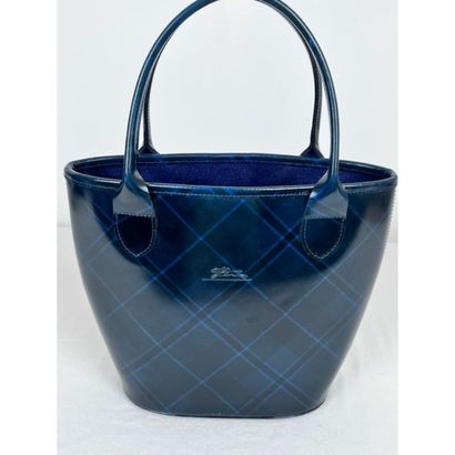 LONGCHAMPS. Bucket bag in squared waxed canvas....