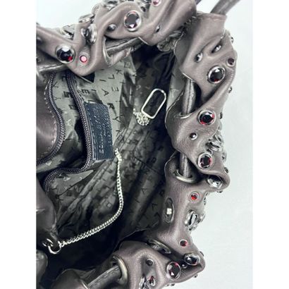 Sonia RYKIEL. Brown leather bag decorated...