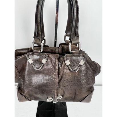 Sonia RYKIEL. Brown aged leather bag. 2 leather...