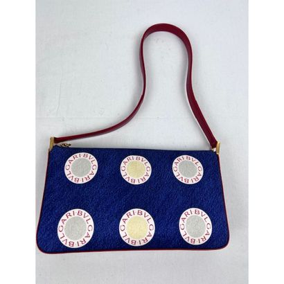 BULGARI. Clutch in blue canvas printed with...