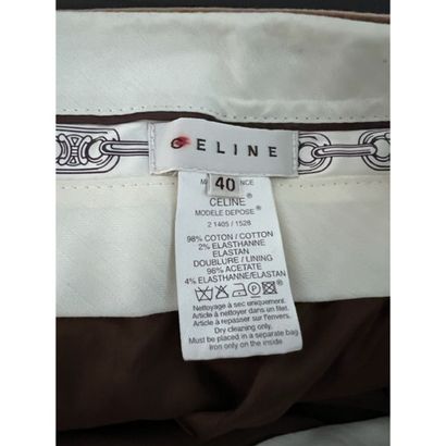 CELINE. Straight pants in beige velvet. Waist...