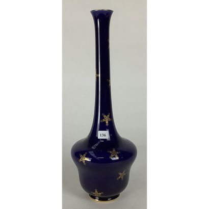 SEVRES. VASE in porcelain on blue bottom...