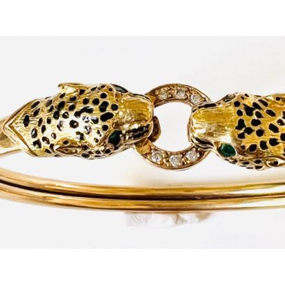 Rigid opening BRACELET in yellow gold 750°/°°°...