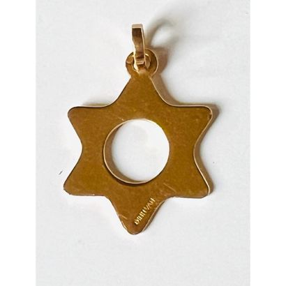 DINH VAN. PENDANT in yellow gold 750°/°°...
