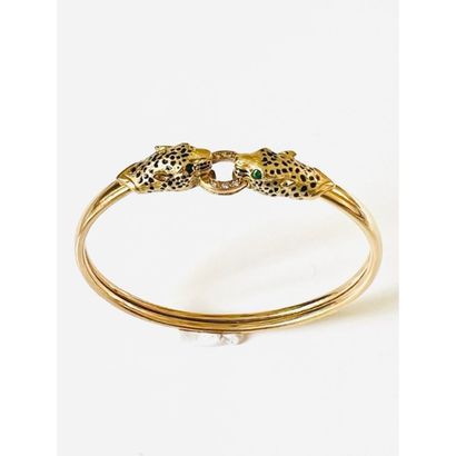 Rigid opening BRACELET in yellow gold 750°/°°°...