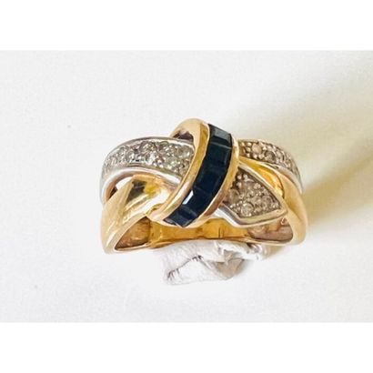 RING 2 crossed beads set with diamonds joined...