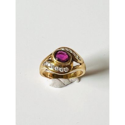 Yellow gold ring 750°/°° set with a ruby...