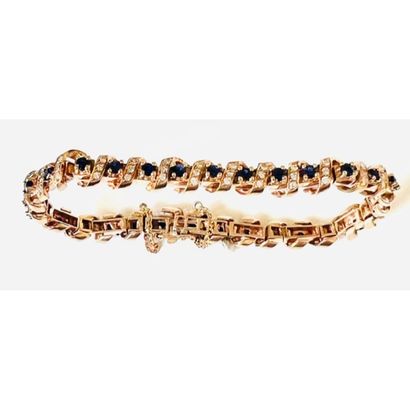 BRACELET in yellow gold 750°/°° decorated...