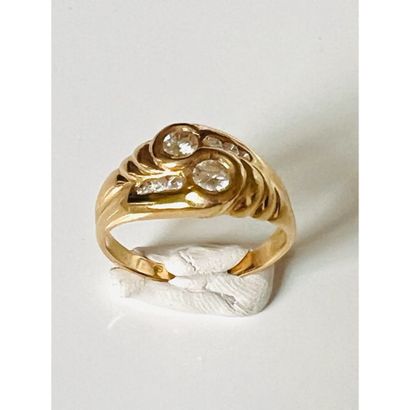 Yellow gold ring 750°/°° 2 twisted crosses...