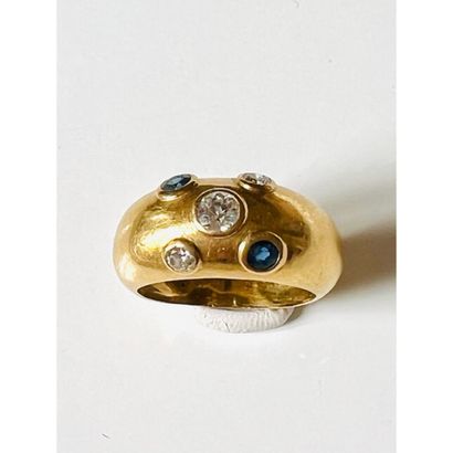 Ring in yellow gold 750°/°° set with 3 diamonds...