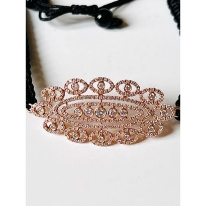 BRACELET in pink gold 750°/°° and black cord...