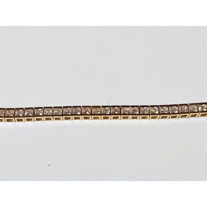 BRACELET tennis in yellow gold 750°/°° decorated...