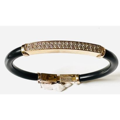OROMALIA. BRACELET in black rubber decorated...