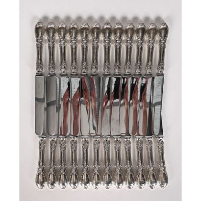 SET OF 24 LARGE TABLE KNIVES with solid silver...