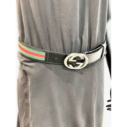 GUCCI. Two-tone green and red canvas belt...
