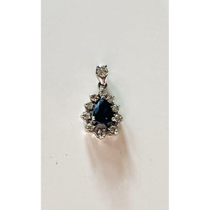 PENDANT in 750°/°° white gold set with a...