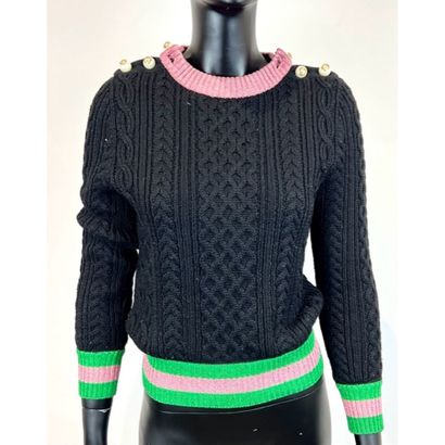 GUCCI. Pull du soir en tricoté de laine noire....