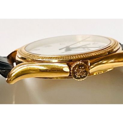 PATEK PHILIPPE. MONTRE en or jaune 750°/°°...