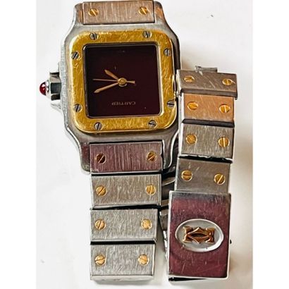 CARTIER. MONTRE Santos acier et or. Fond...