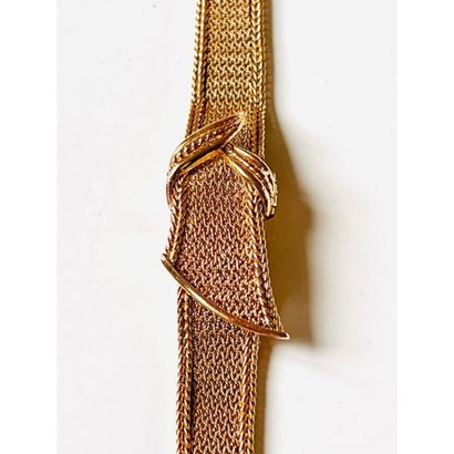 MOVADO. MONTRE de dame en or jaune tressé...