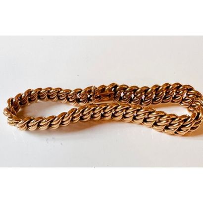 BRACELET en or jaune 750°/°° maille gourmette...