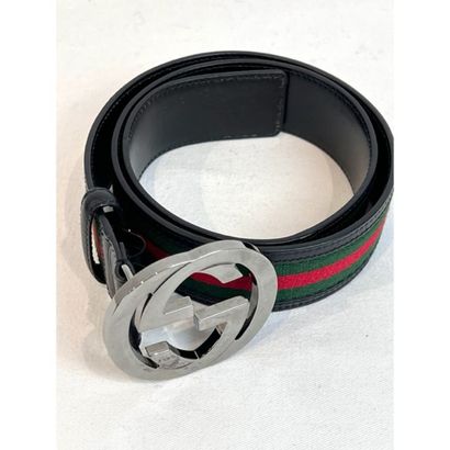 GUCCI. Two-tone green and red canvas belt...