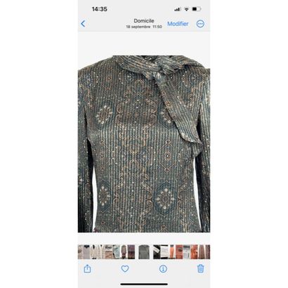 CELINE. Robe longue à volant en soie imprimée...