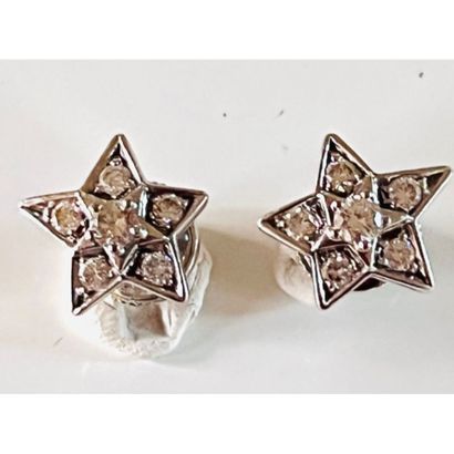 Star earrings in white gold 750°/°° set with...