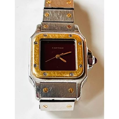 CARTIER. MONTRE Santos acier et or. Fond...