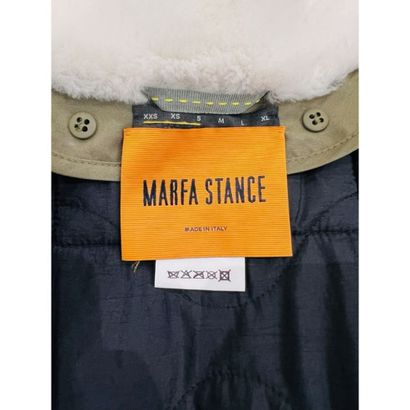 MARFA STANCE. Manteau matelassé réversible....