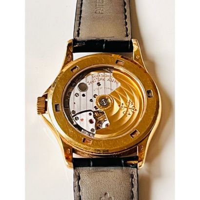 PATEK PHILIPPE. MONTRE en or jaune 750°/°°...