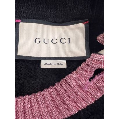 GUCCI. Pull du soir en tricoté de laine noire....