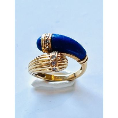 BAGUE croisée godronnée en or jaune 750°/°°...