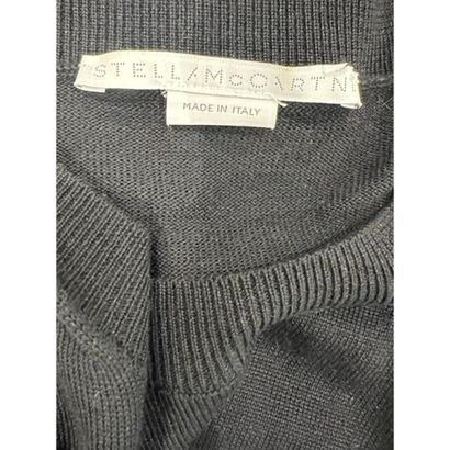 Stella MAC CARTNEY. Robe en laine noire simulant...