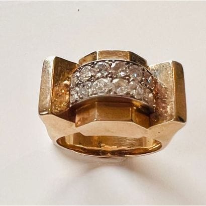 1950. BAGUE pont en or jaune 750°/°° rhodié...