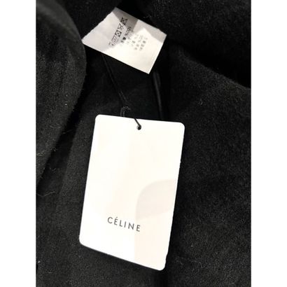CELINE. Robe longue du soir en laine noire....