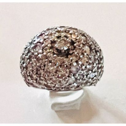1950. DOME RING in white gold 750°/°° set...