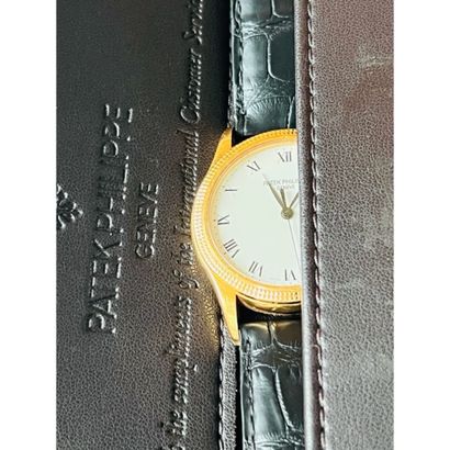 PATEK PHILIPPE. MONTRE en or jaune 750°/°°...
