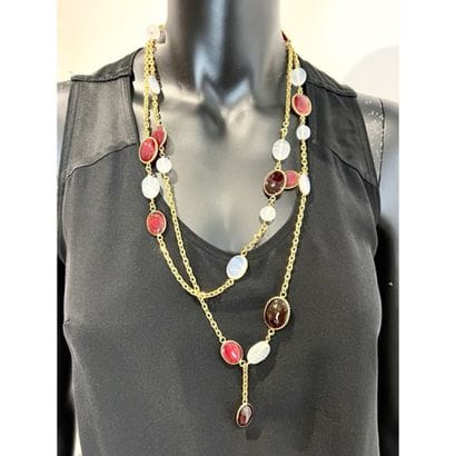 CHANEL. Gilded metal sautoir adorned with...