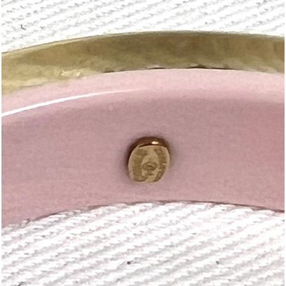 CHANEL. Rigid bracelet in transparent Plexiglas...