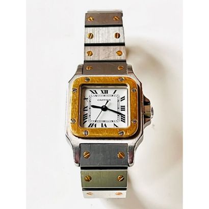 CARTIER. MONTRE Santos acier et or. Boîtier...