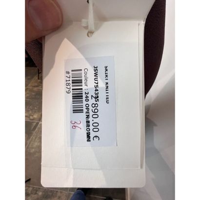 Jil SANDER. Jupe longue destructurée en soie,...