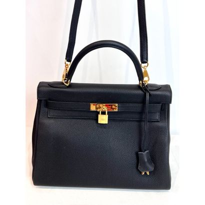 HERMES. Sac Kelly (32cm) en cuir Togo noir...