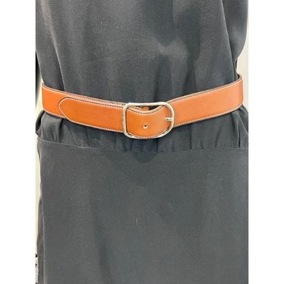 HERMES Paris. Tan leather and white saddle-stitched...