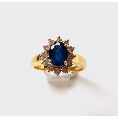BAGUE fleur en or jaune 750°/°° ornée d’un...
