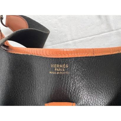 HERMES. Sac «Evelyne» en cuir Togo noir et...