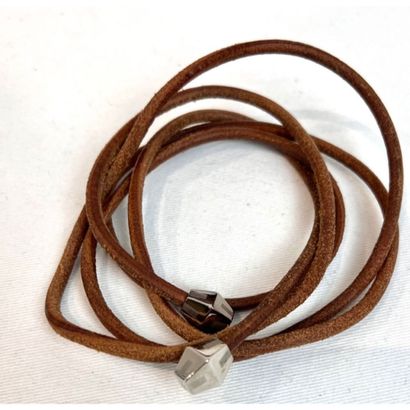 HERMES. Gold leather lace multirang bracelet...